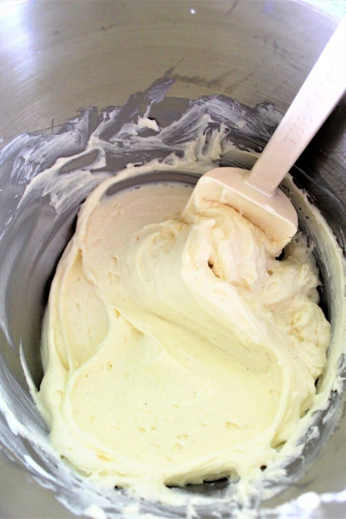 fresh cannoli cream in mixer bowl with spatula