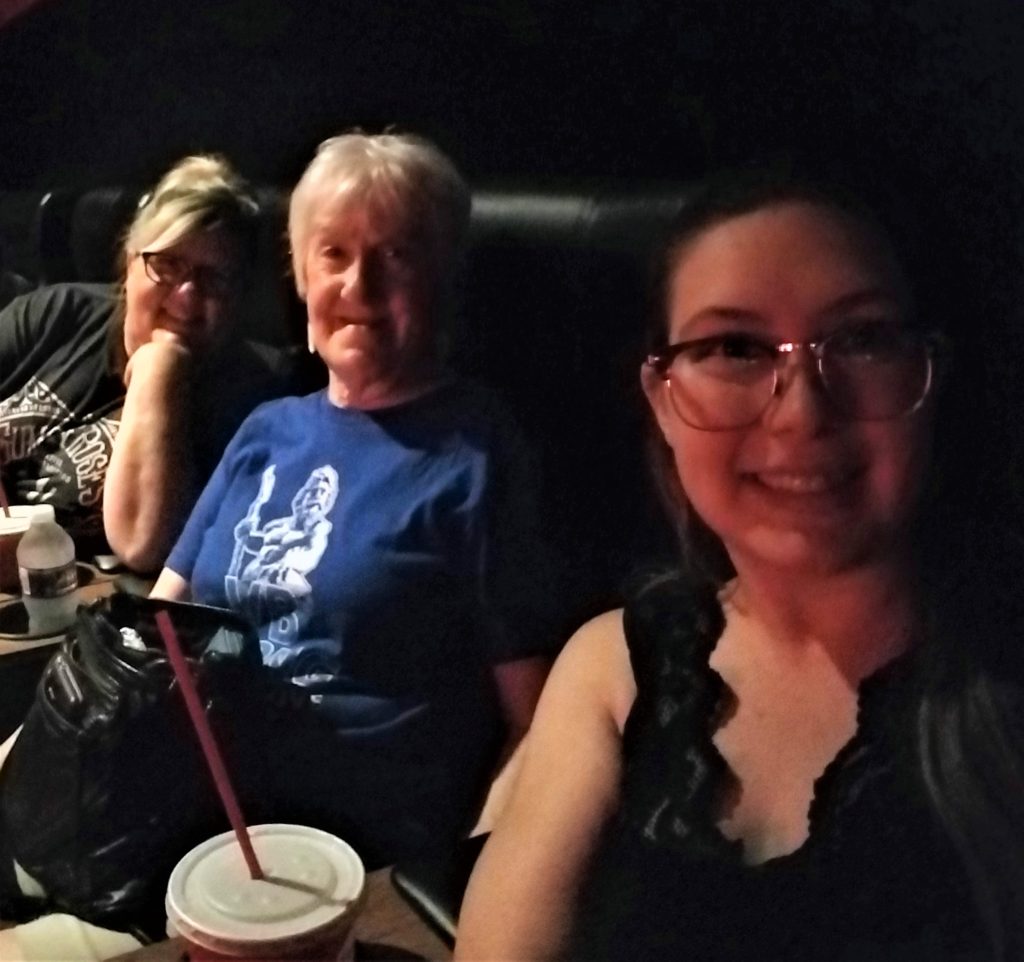 Kim, mom, and Bre at the movies