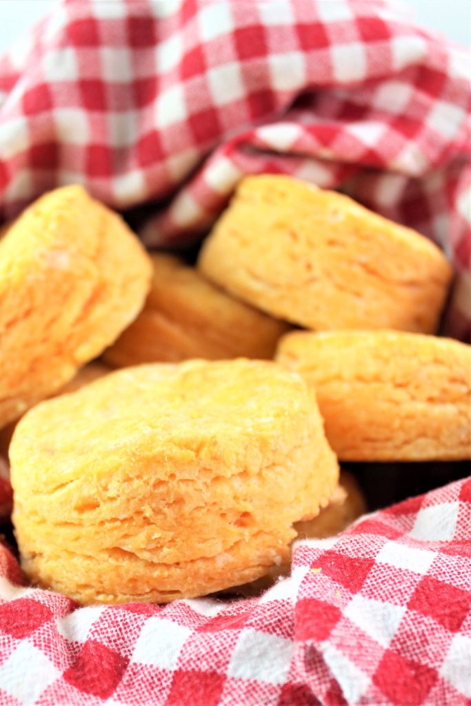 sweet potato biscuits in red checked basket