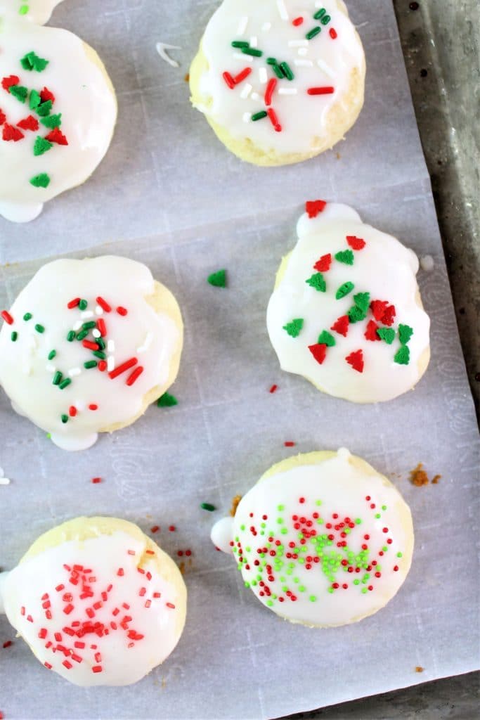 gf ricotta cookies on baking sheet with sprinkles
