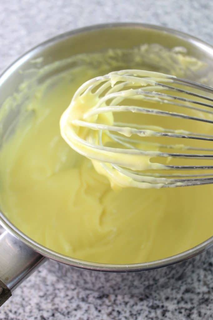 pastry cream in the saucepan with whisk