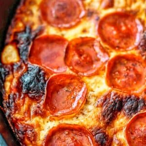 up close picture of half of a pepperoni pan pizza.