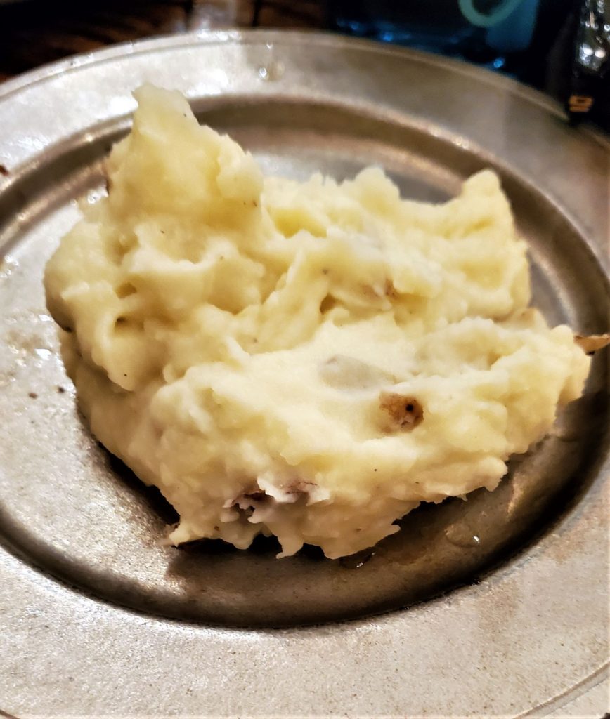 mashed potatoes on silver plate