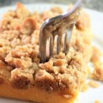gluten free crumb cake piece with a fork in it