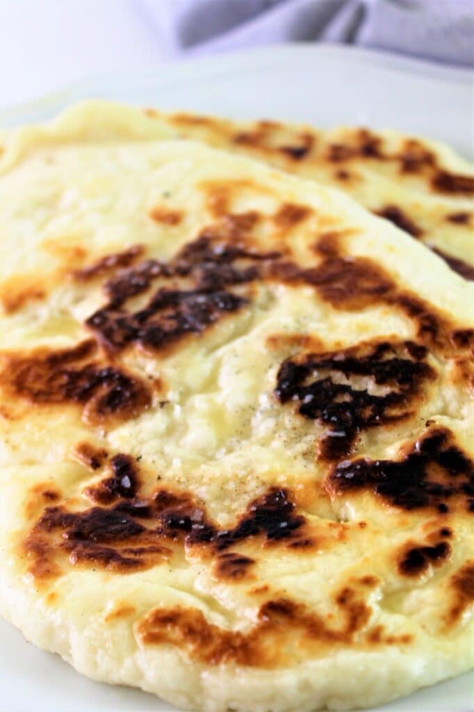 yeast free naan on a white plate