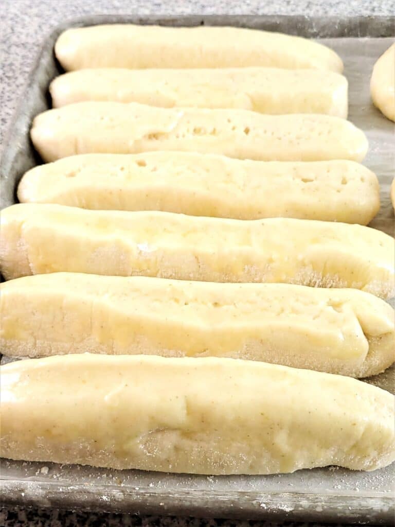 shaped and fully risen hot dog buns