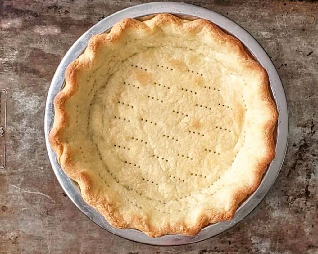 blind baked pie crust on sheet pan.