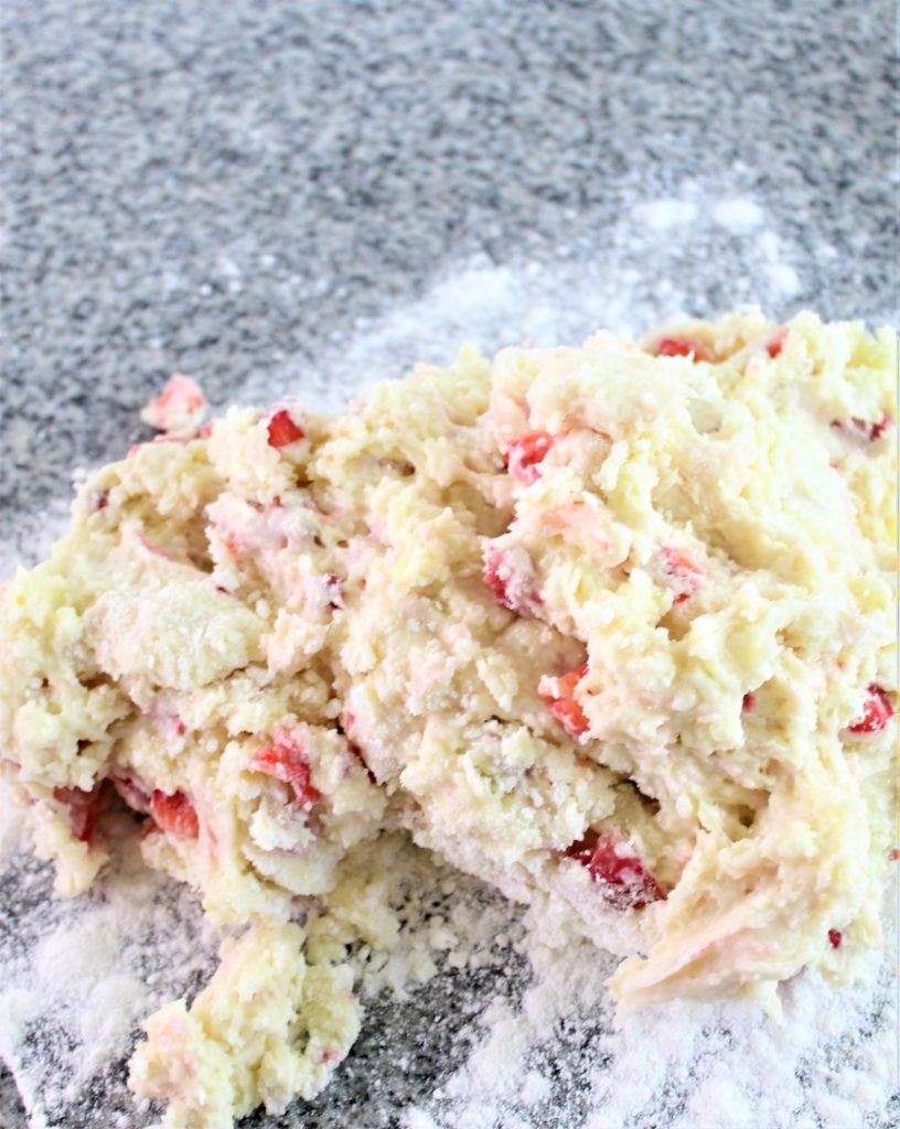 dump dough onto floured surface