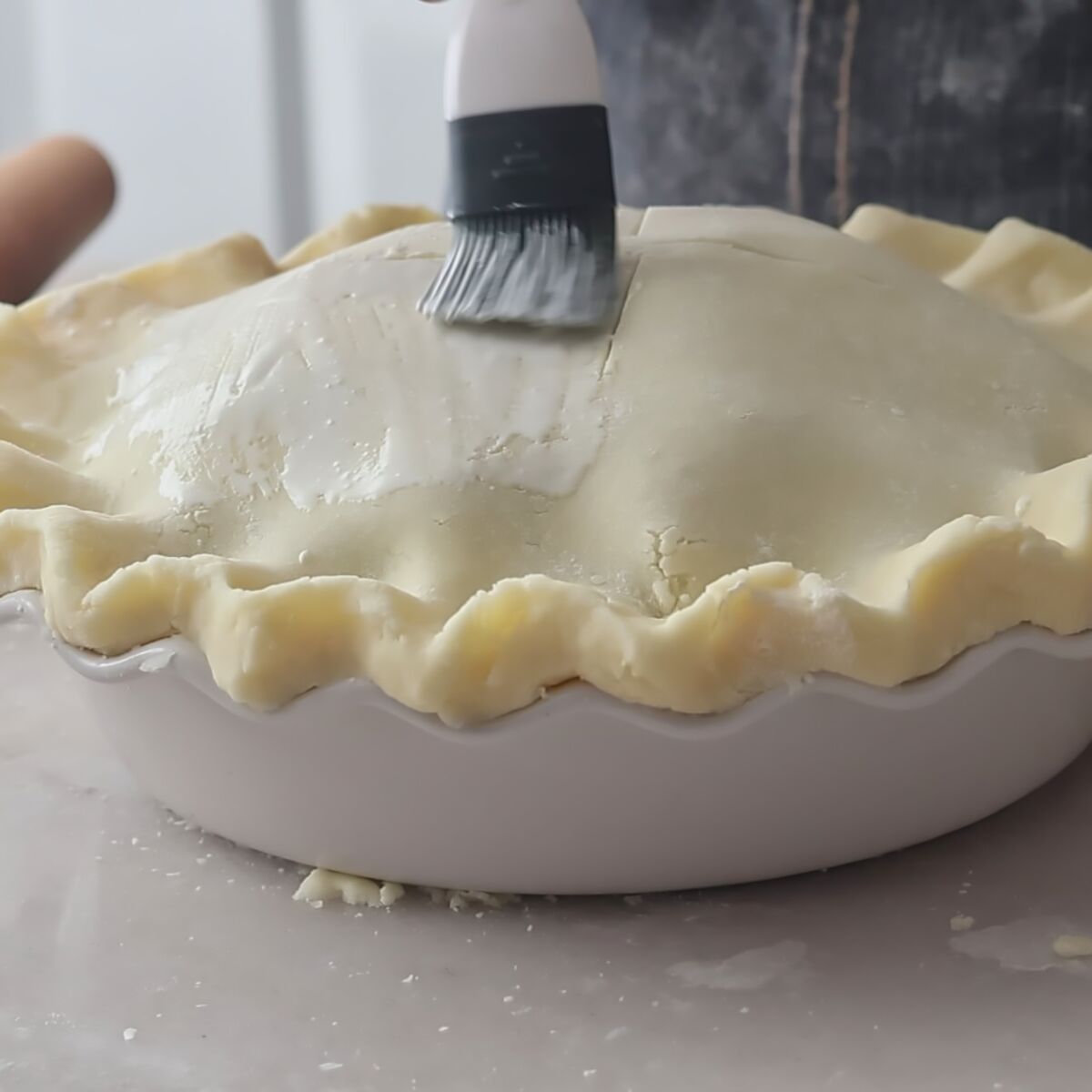 brushing top crust with heavy cream.
