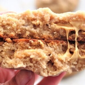 cookie split in two with gooey caramelized white chocolate