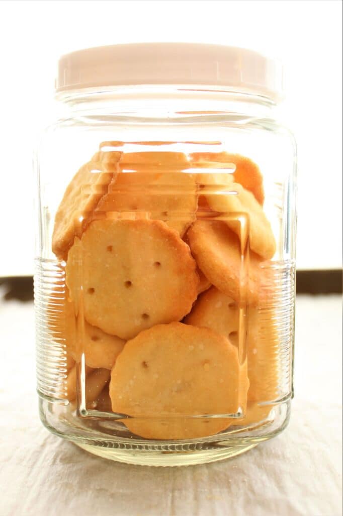 crackers in a glass jar with white lid