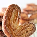 one palmier resting against a stack of palmier