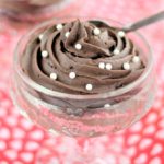 oreo mousse in glass dessert dish on red and white heart paper