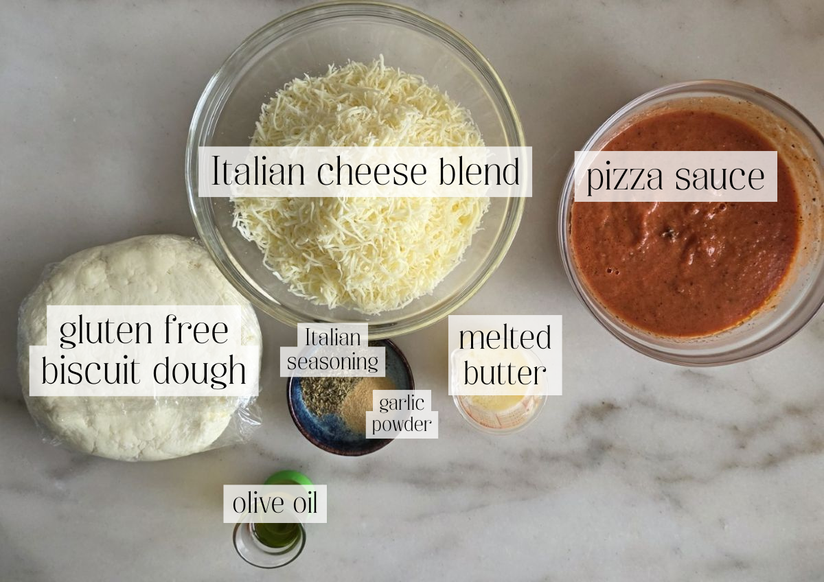 pizza pull apart biscuits ingredients measured out and labeled.