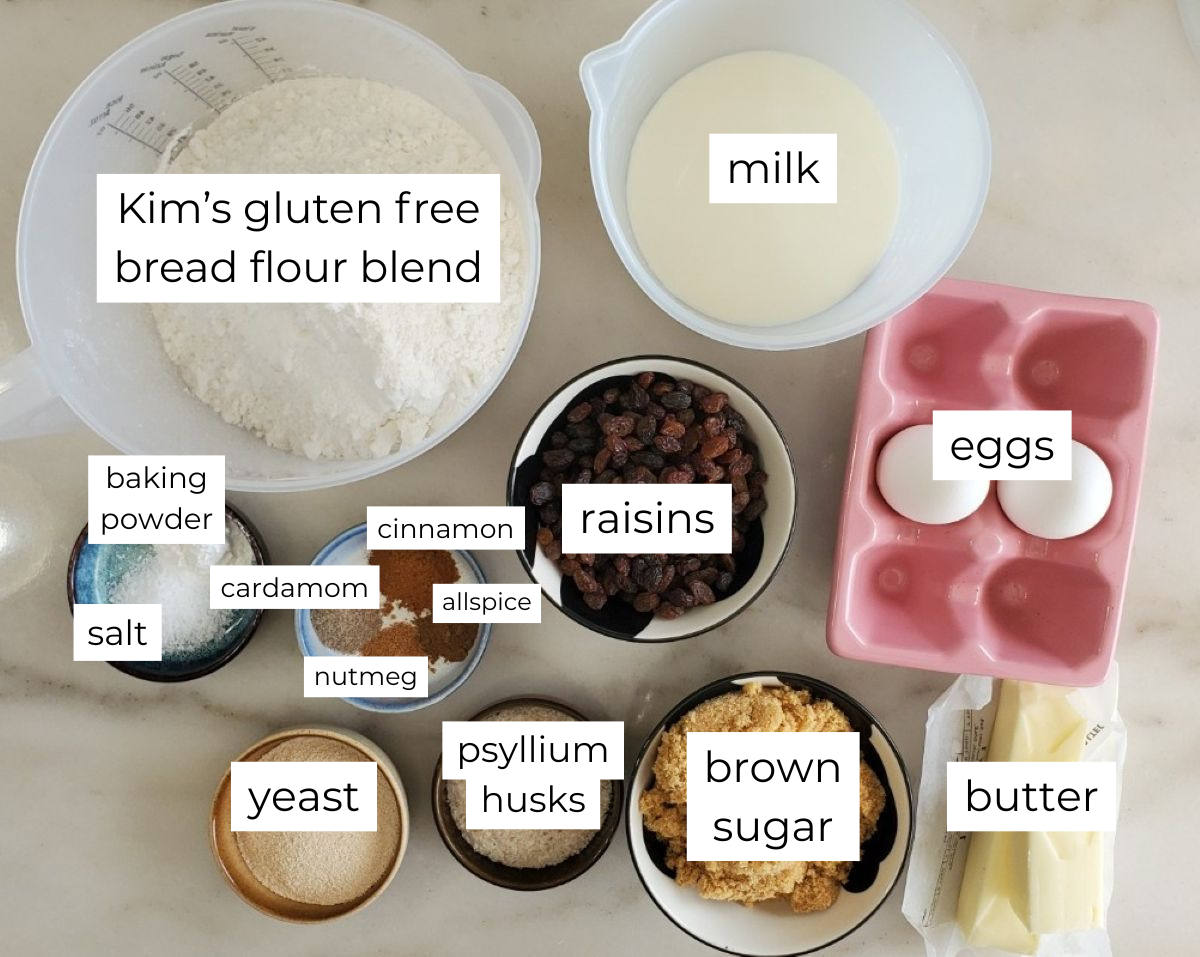 ingredients measured out and labeled on white marble counter.