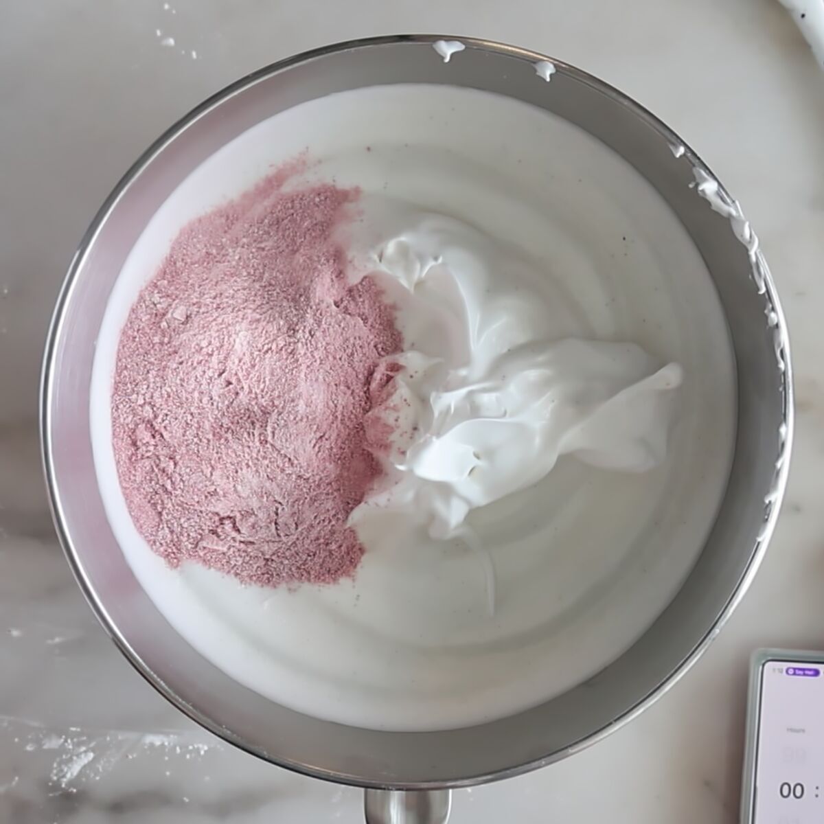 strawberry flour blend on top of whipped egg whites.