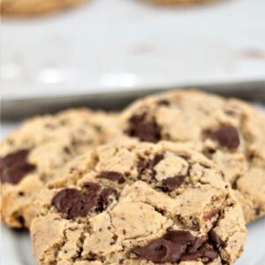 gluten free brown butter chocolate chunk cookies on white plate