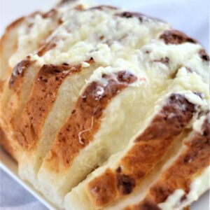 gluten free cheesy bread on white platter