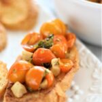 gluten free bruschetta on white platter