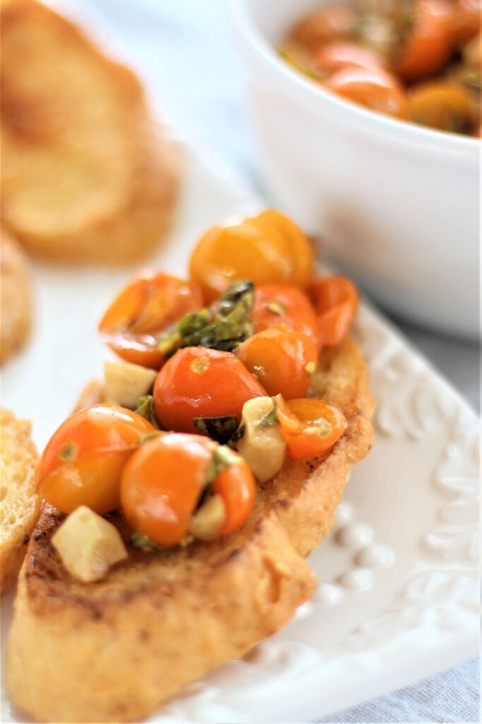 gluten free bruschetta on white platter