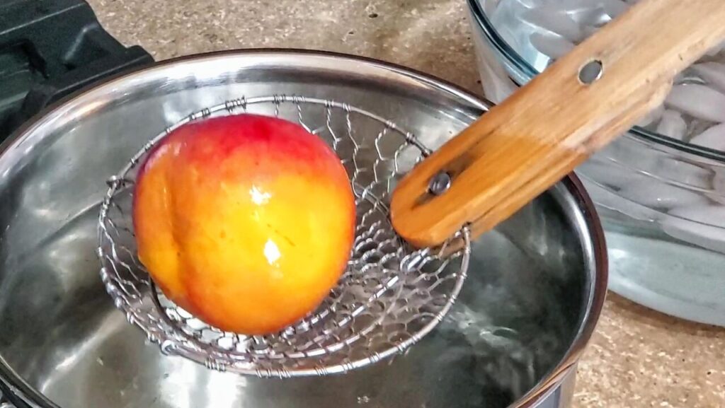 blanching peaches in boiling water