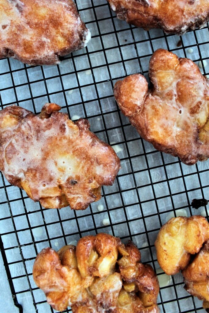 gluten free apple fritters on wire rack