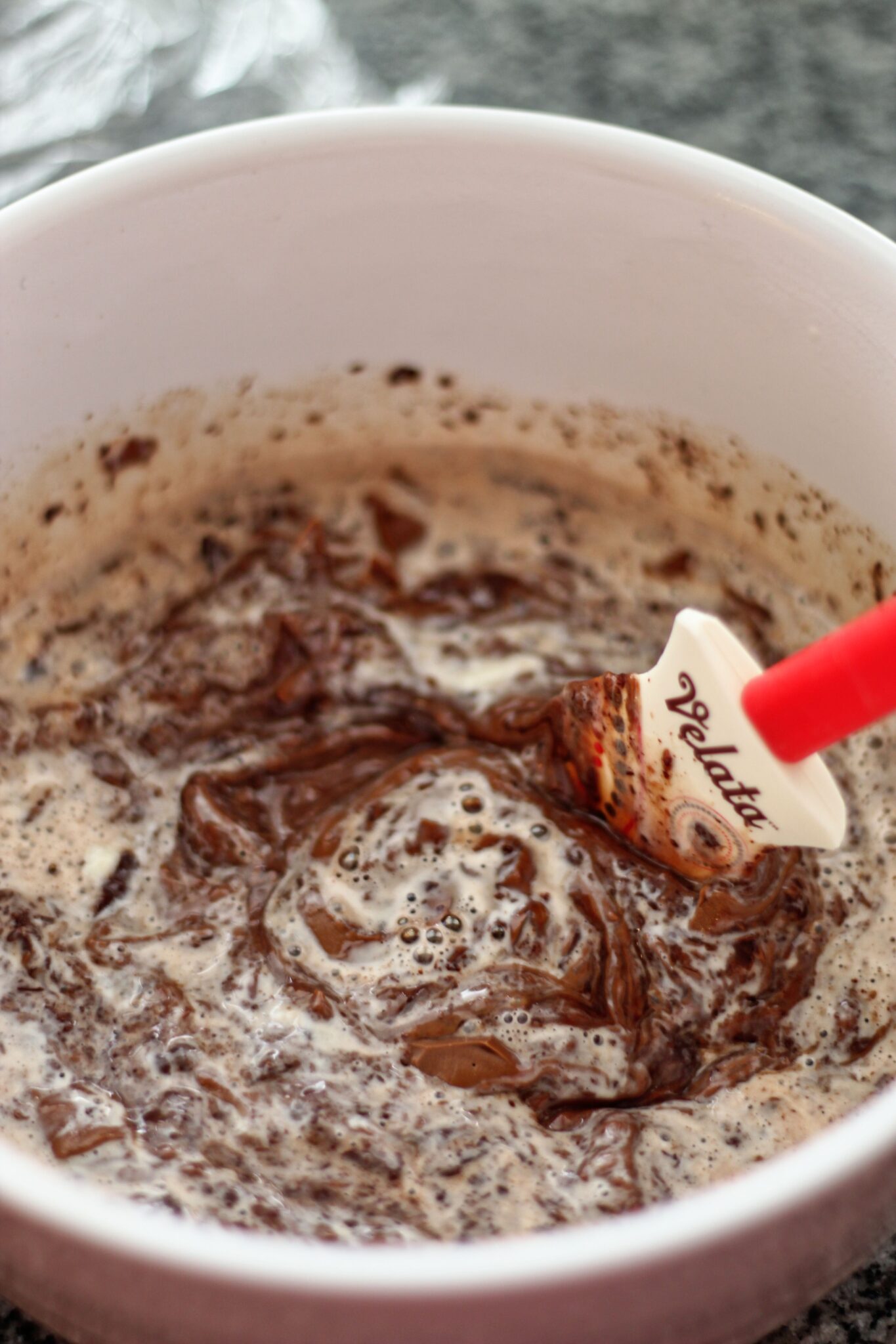 stirring chocolate ganache