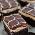 gluten free tuxedo brownies on parchment paper