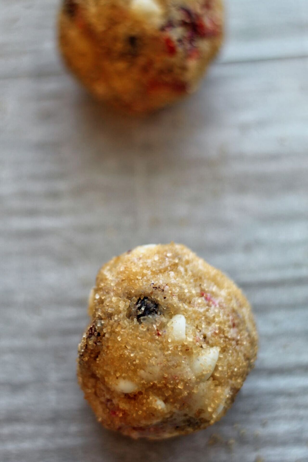 balls of dough rolled in turbinado sugar