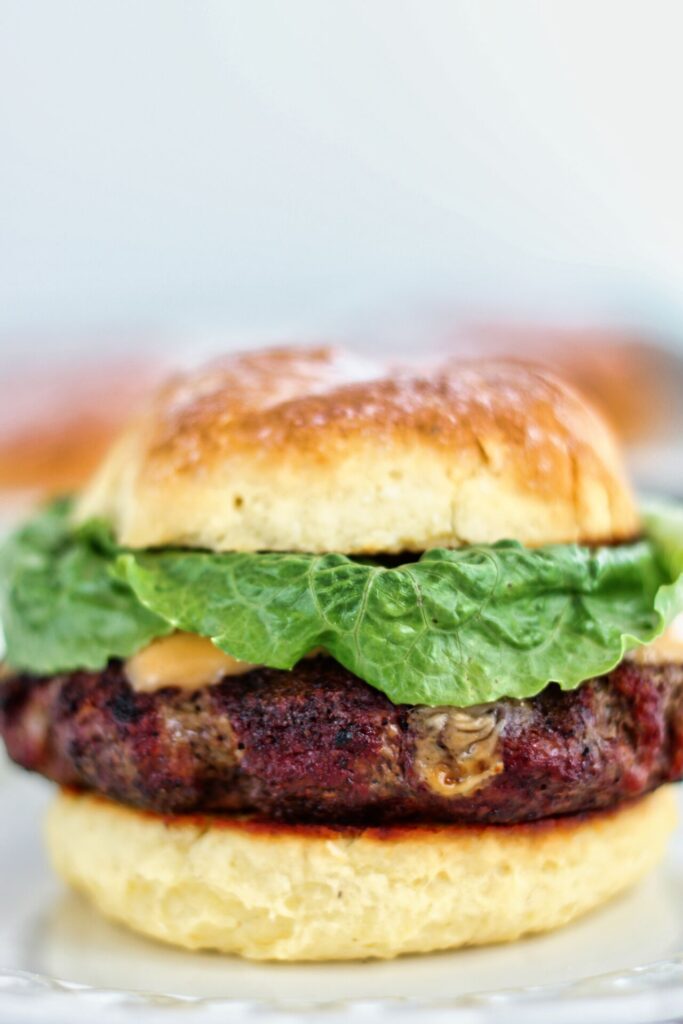 cheeseburger on gluten free bun with lettuce