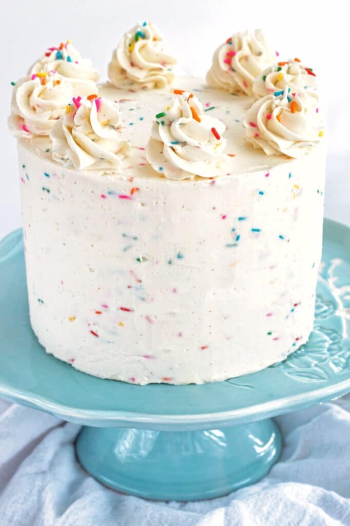 gluten free funfetti cake on blue cake stand