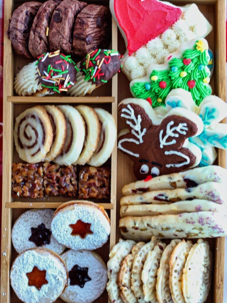 christmas cookie box with eight varieties of cookies.