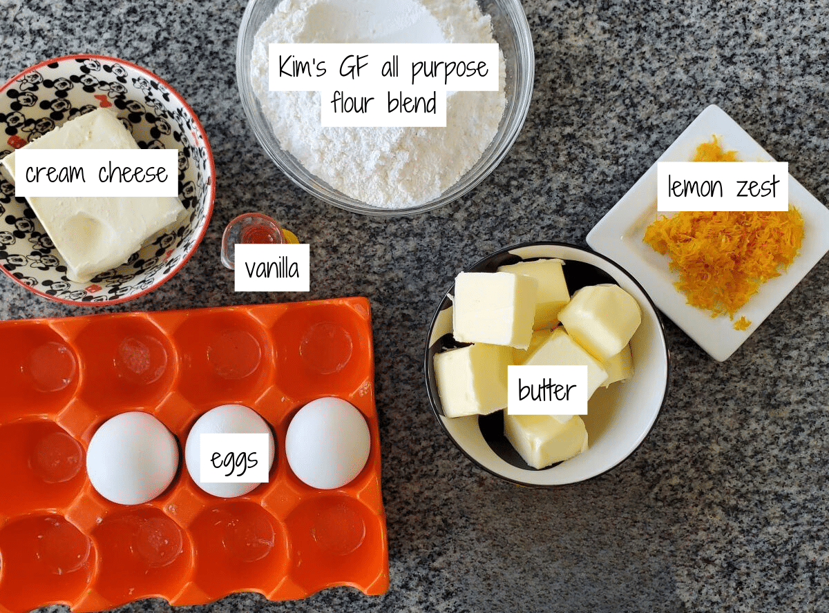 ingredients for lemon loaf cake measured out and labeled.