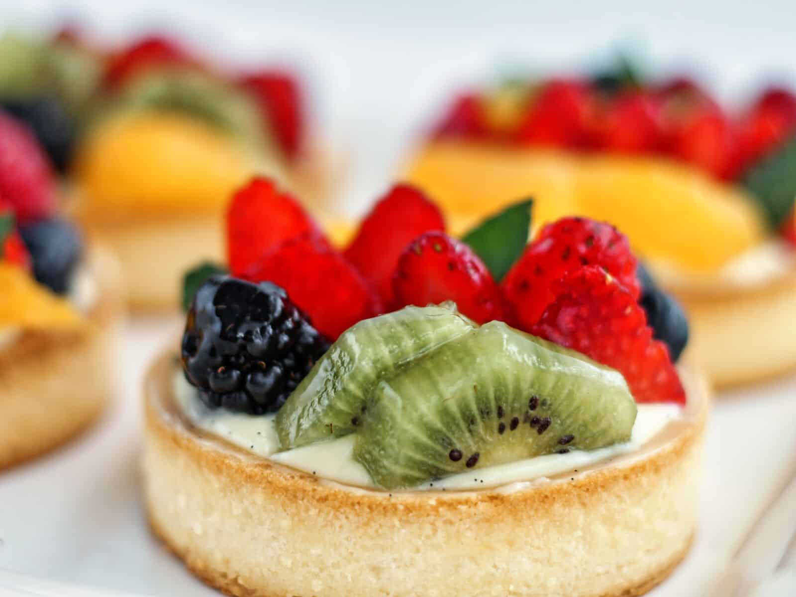 https://www.letthemeatgfcake.com/wp-content/uploads/2023/05/fruit-tartlets.jpg