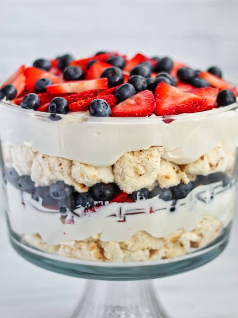 gluten free patriotic trifle in trifle bowl showing layers.