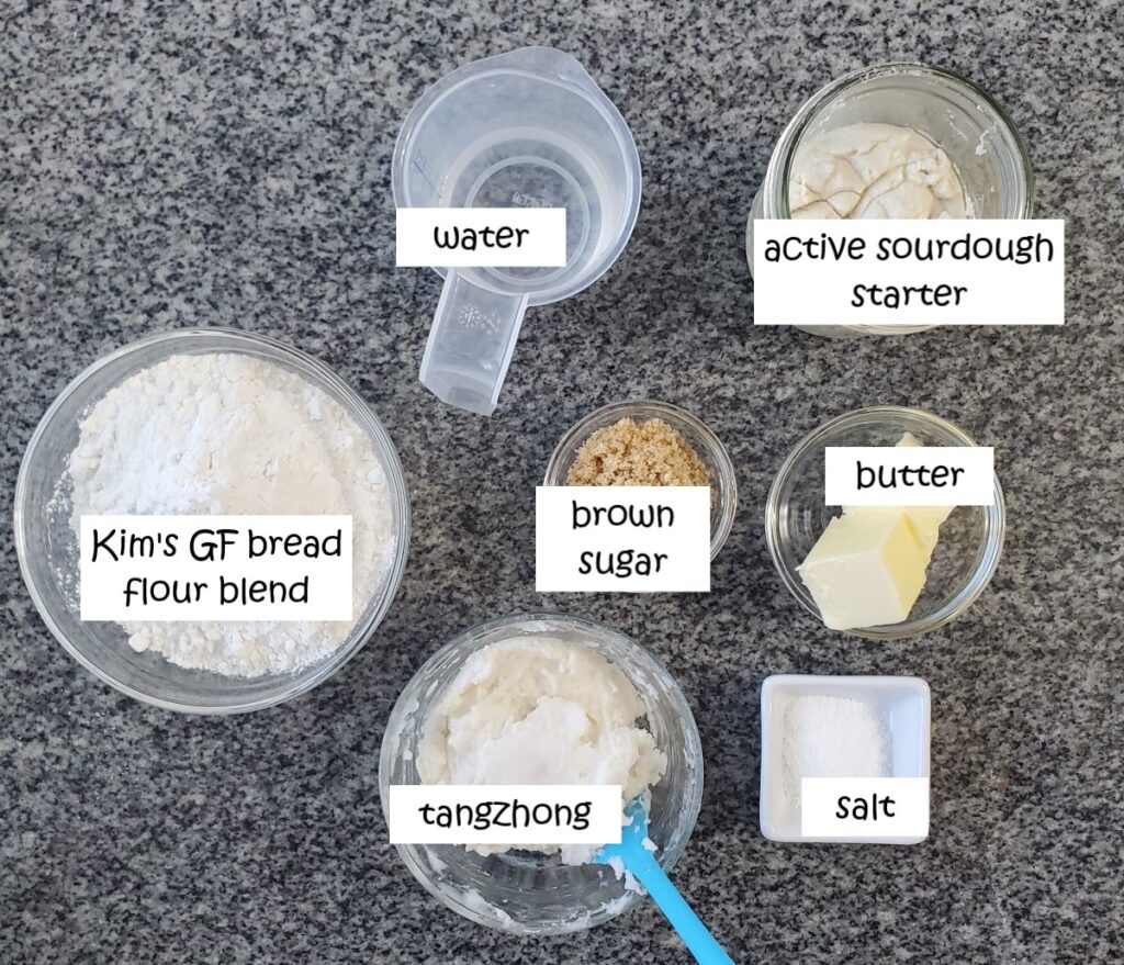 ingredients for sourdough pretzels measured out and labeled.