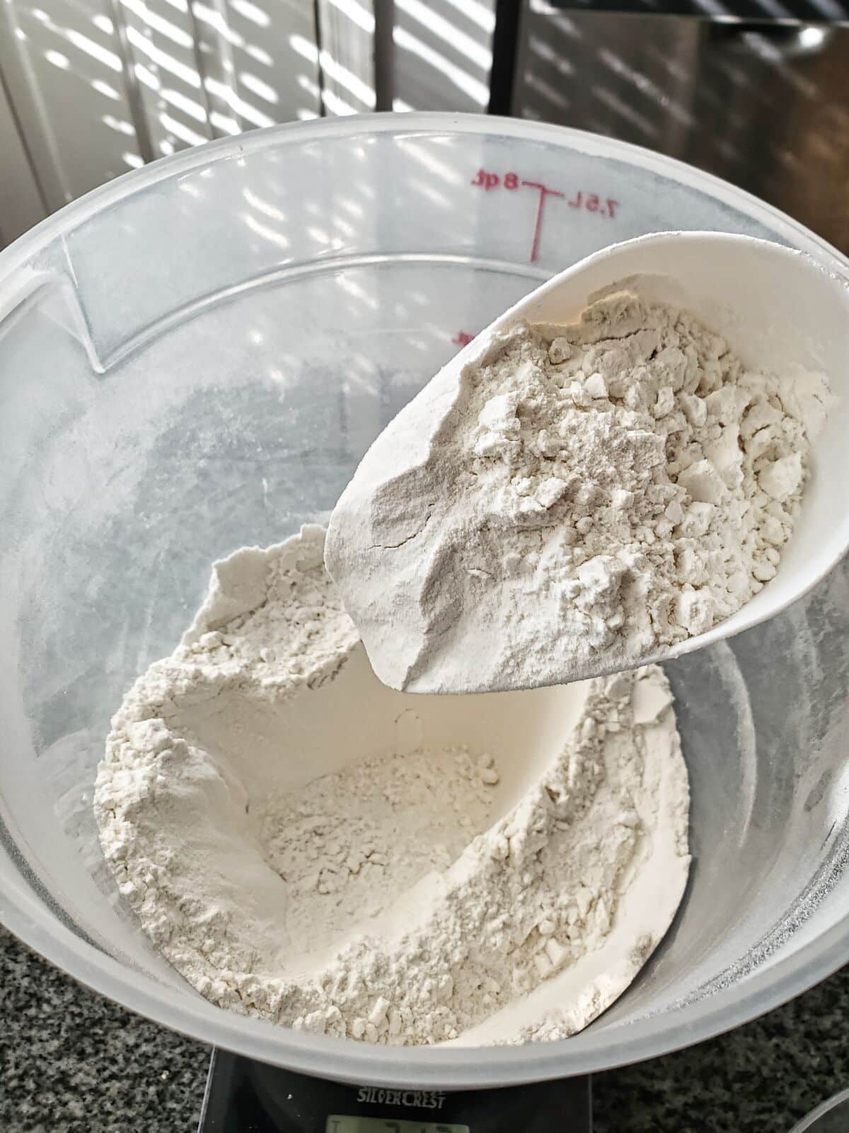 mixing components in large container to create AP flour.