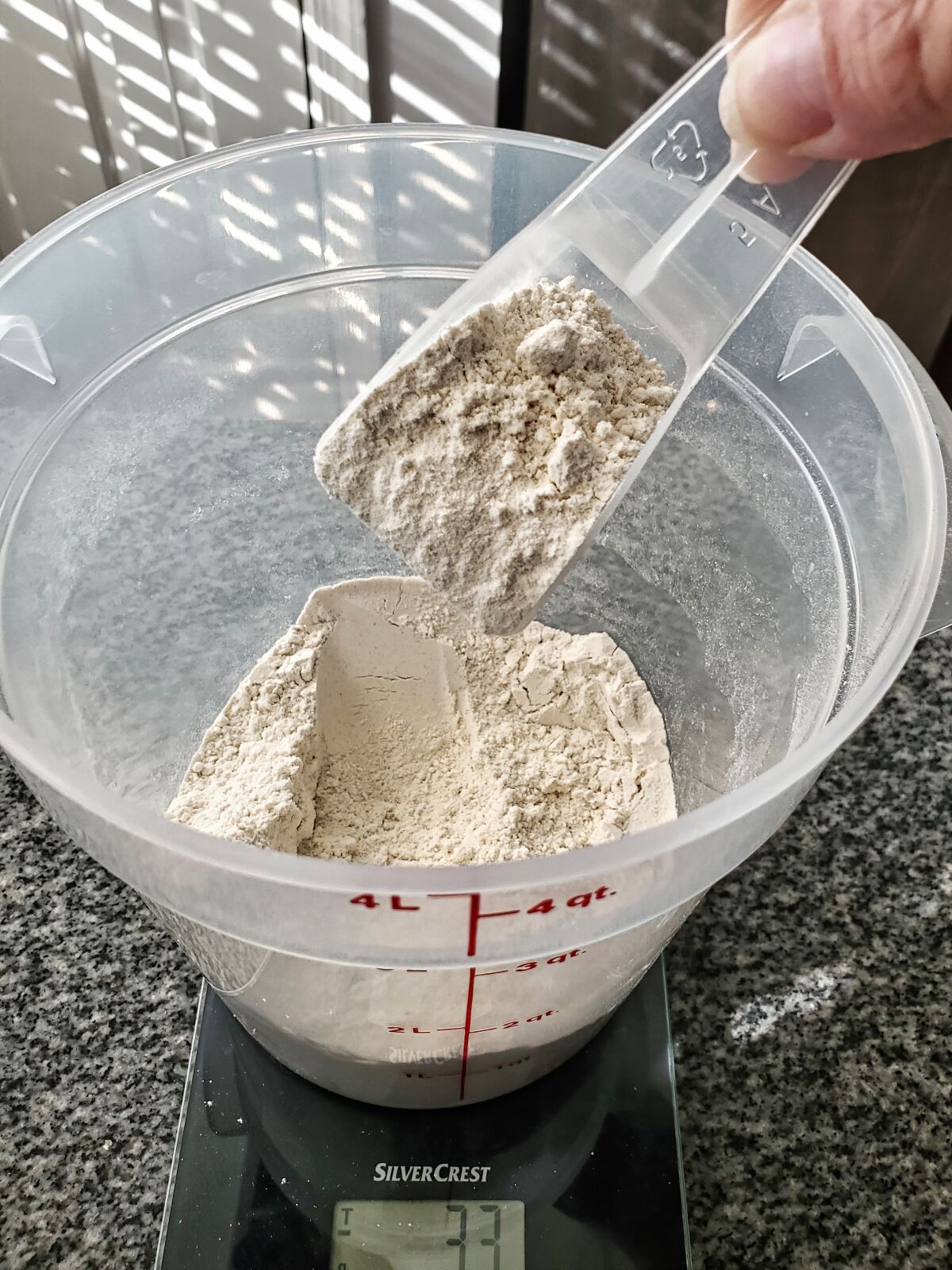 mixing multigrain flour blend.