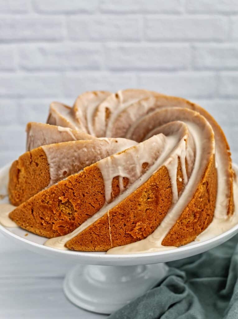 gluten free pumpkin pound cake up close on black cake stand