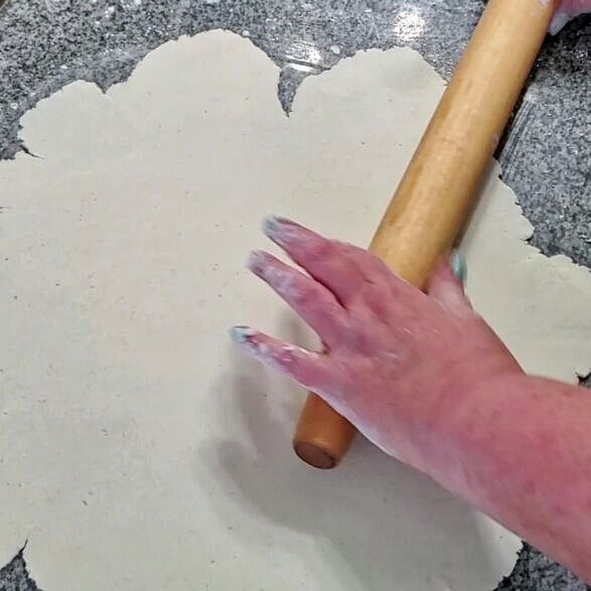 rolling dough really thin on granite countertop.