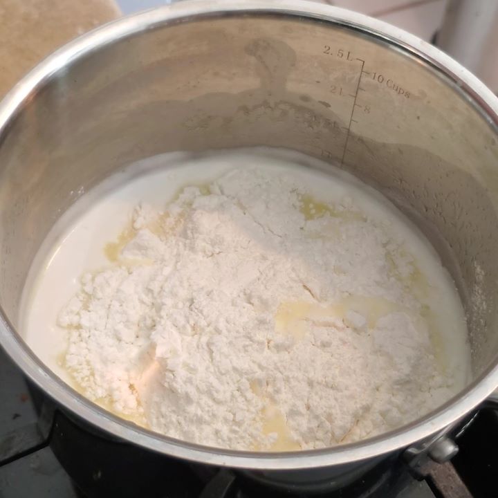 flour dumped into boiling liquid in small saucepan.