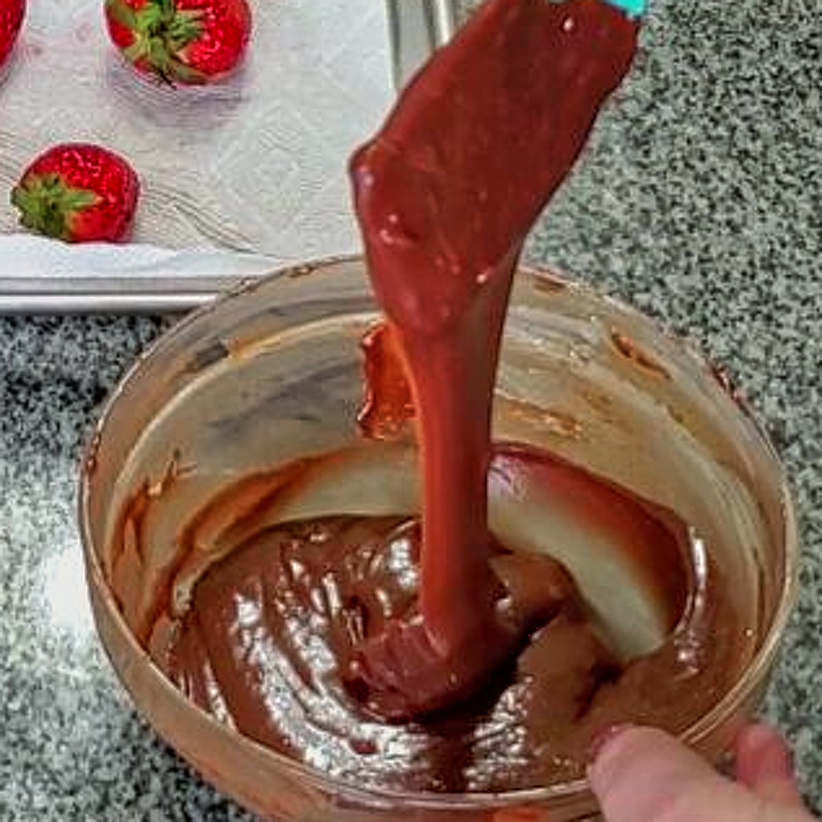 stirring ganache with silicone spatula until smooth.