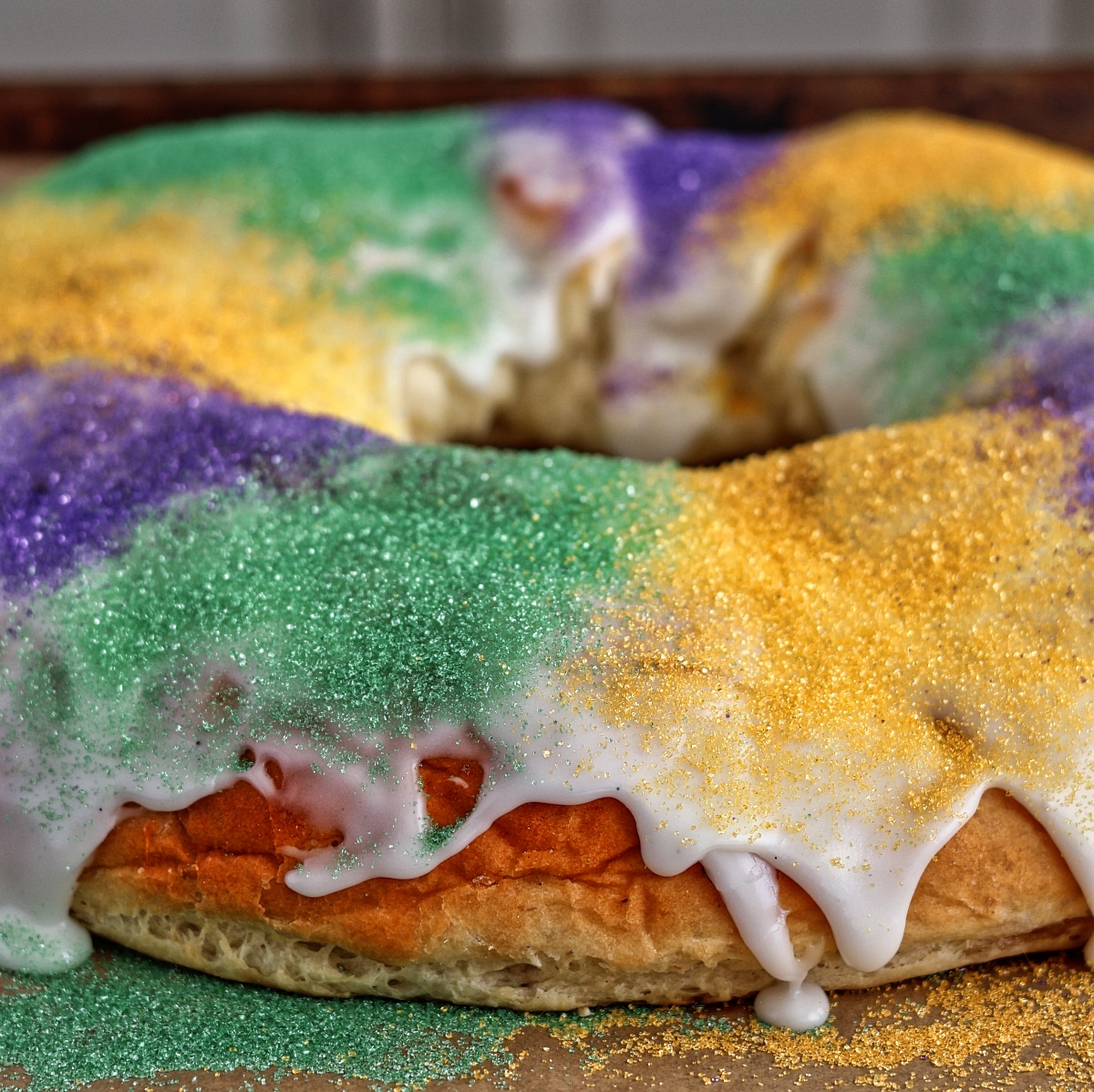 purple, green, and gold gluten free king cake.