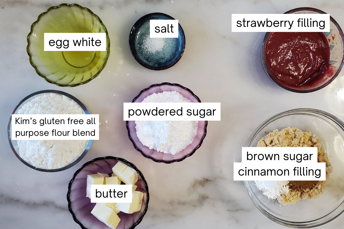 ingredients for poptarts measured out and labeled on marble countertop.