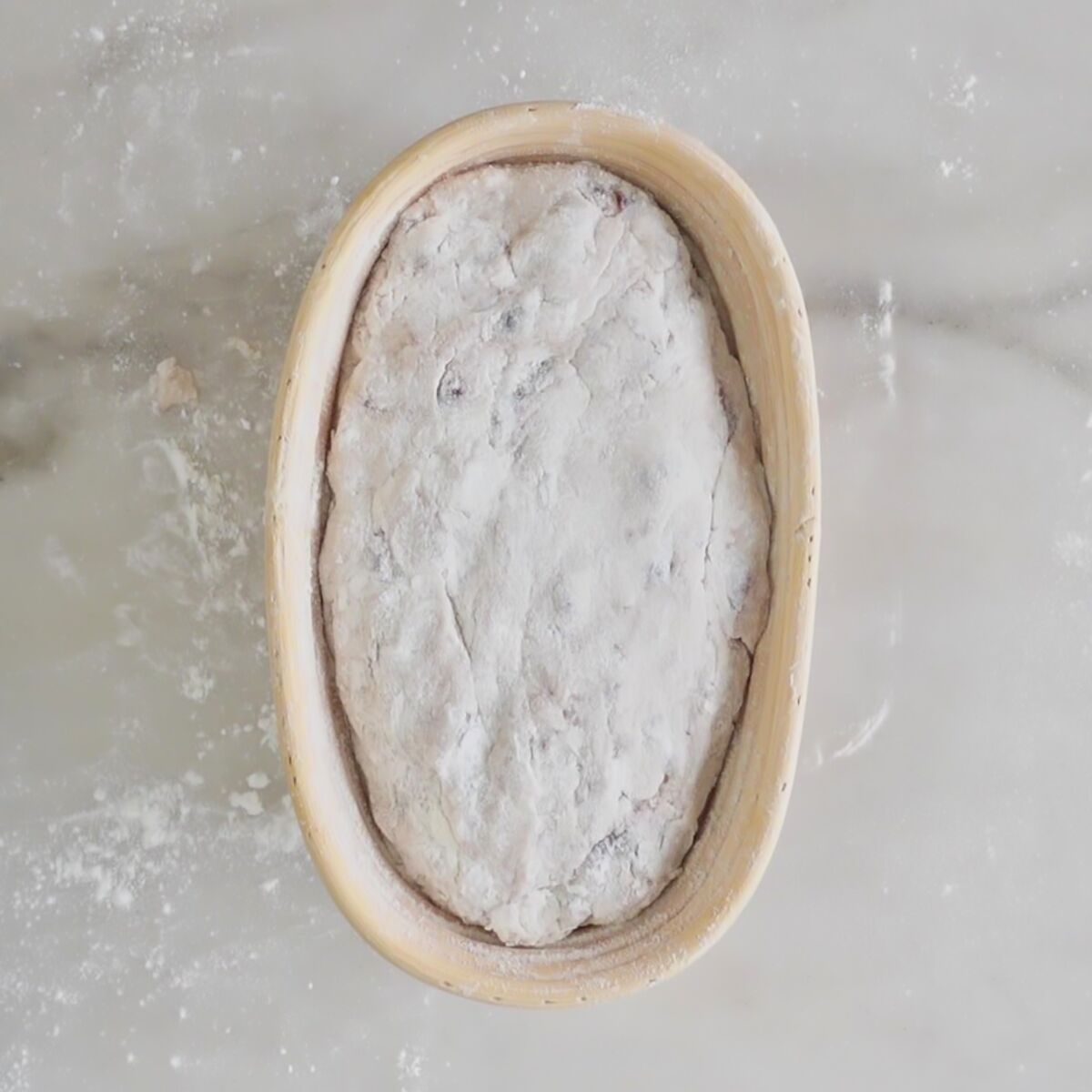 shaped dough in banetton basket.