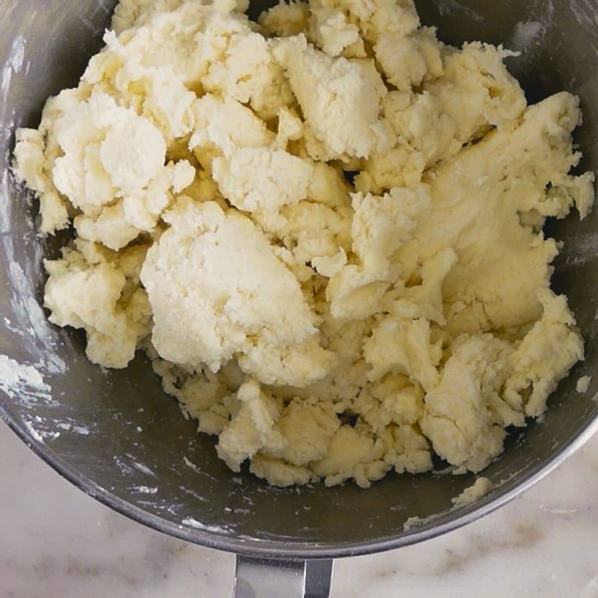 shaggy dough in bowl of stand mixer.