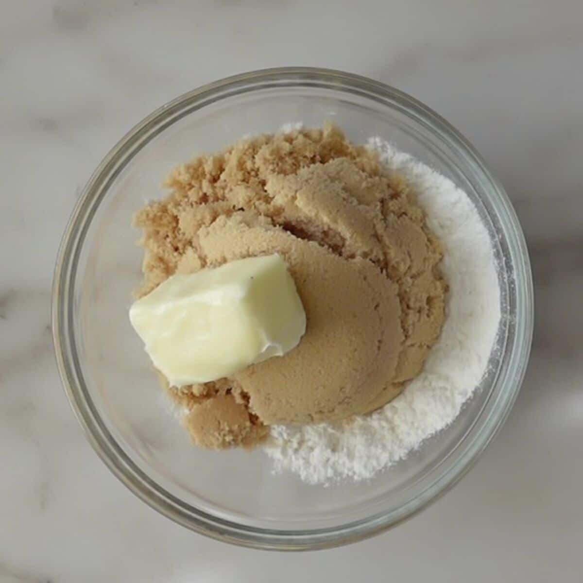 butter, brown sugar, and gf flour in medium glass bowl.