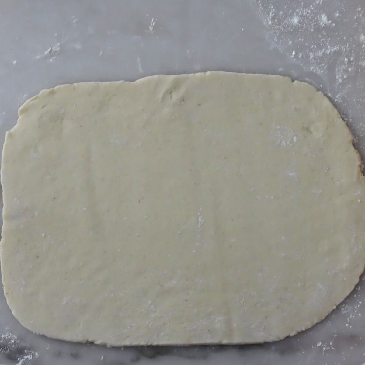 dough rolled out into a rectangle.
