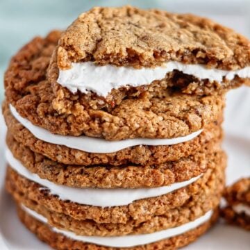 half of an oatmeal creme pie stacked on top of two more.