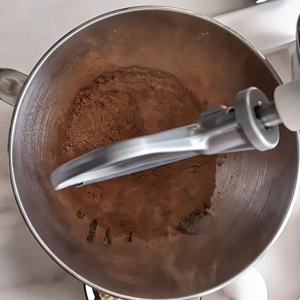 cocoa powder in bowl of stand mixer.